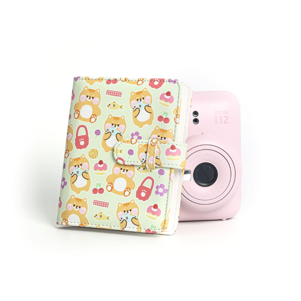Pikxi 64 Pockets Cute Animal Prints Leather Photo Album with Slip Strap Closure for FUJIFILM Instax Mini Instant Film Camera - Available in Strawberry Rabbit, Sweet Cat, Blue Bear, Baby Penguin, Snack Bear Designs