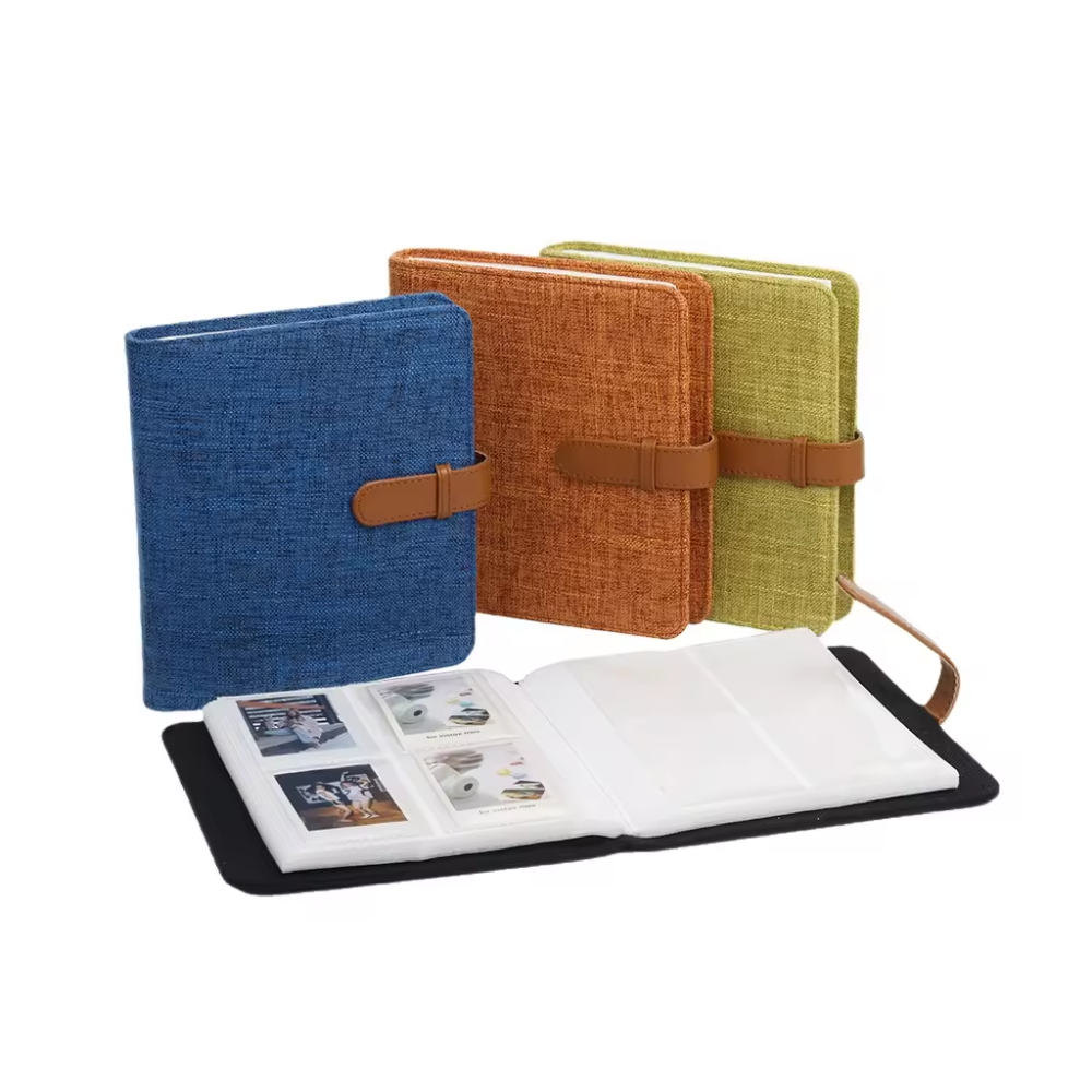 Pikxi Simple Design 288 Pocket Linen Photo Album Book for Instax Mini 12/11/EVO/Liplay Film with Leather Strap - Available in Black, Blue, Green, and Orange Colors