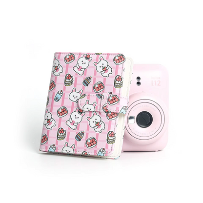 Pikxi 64 Pockets Cute Animal Prints Leather Photo Album with Slip Strap Closure for FUJIFILM Instax Mini Instant Film Camera - Available in Strawberry Rabbit, Sweet Cat, Blue Bear, Baby Penguin, Snack Bear Designs