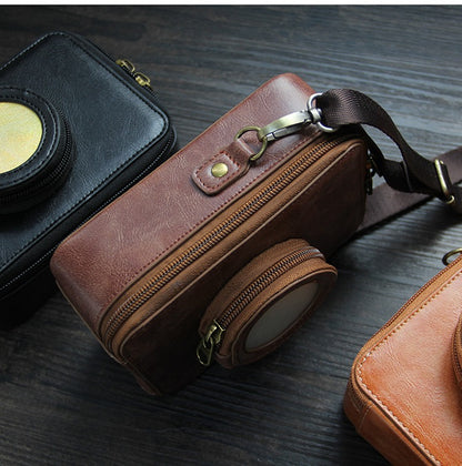 [CLEARANCE] Pikxi BEVO-01 Vintage Style Leather Carrying Bag with Built-In Photo Pocket, Adjustable Shoulder Straps, and Compact Lens Compartment for Instax Mini EVO Cameras - Coffee