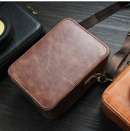 [CLEARANCE] Pikxi BEVO-01 Vintage Style Leather Carrying Bag with Built-In Photo Pocket, Adjustable Shoulder Straps, and Compact Lens Compartment for Instax Mini EVO Cameras - Coffee