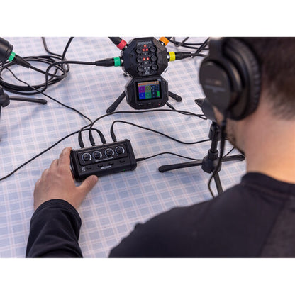 Zoom ZHA-4 Handy Headphone Amplifier Battery-Powered with 4 Channels Monitoring and 4 Outputs Switches for Mobile Audio Recording Setups, Music and Podcasting