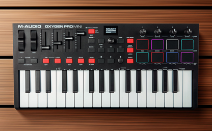 [CLEARANCE] M-Audio Oxygen Pro Mini MIDI Controller with Smart Chord and Smart Scale Technology and 32-Key USB Powered MIDI controller Feature