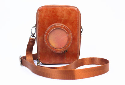 Pikxi Leather Carrying Bag for Instax Mini EVO with 2.5" x 3" Photo Pocket and Compact Lens Compartment (Brown)