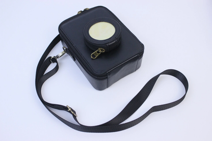 Pikxi Leather Carrying Bag for Instax Mini EVO with 2.5" x 3" Photo Pocket and Compact Lens Compartment (Brown)